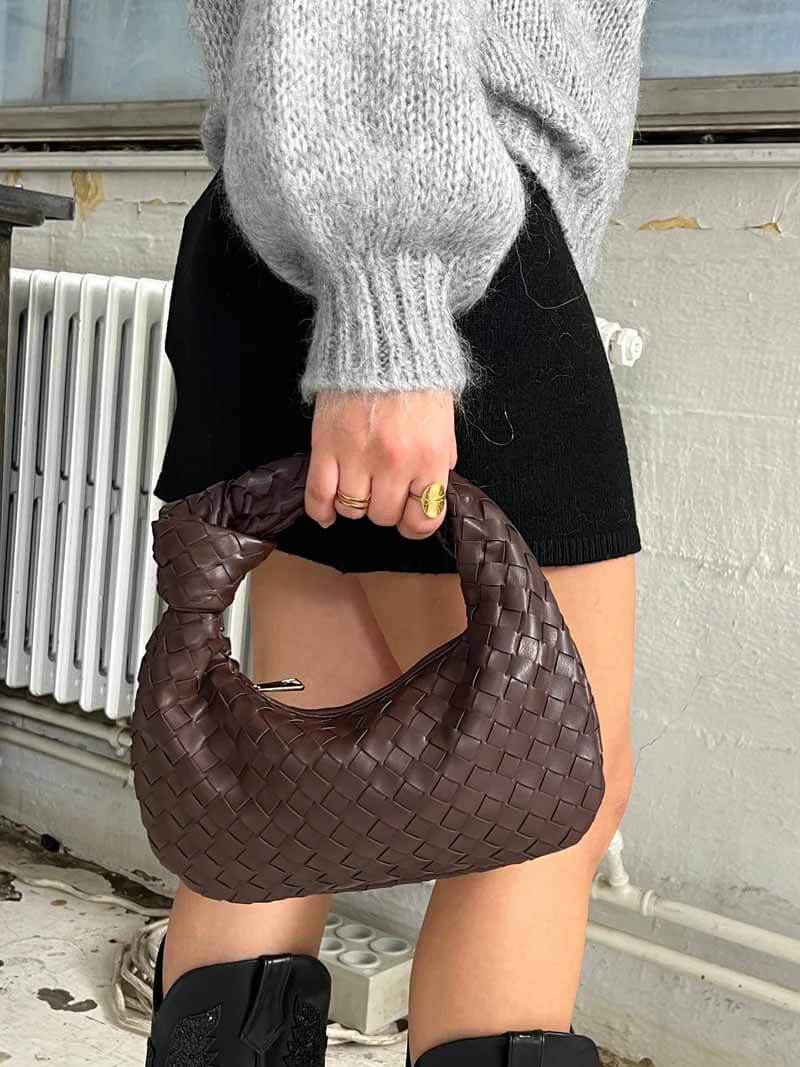 Women’s Woven Handbag With Knotted Handle And Curved Shape